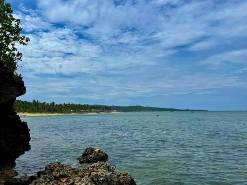 a view of the beach from the shore at Siargao Million Dollar View in Burgos