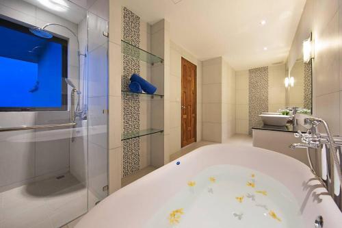 Ένα μπάνιο στο Beach View Villa