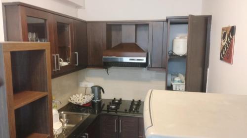 Kuchyň nebo kuchyňský kout v ubytování Nuwara eliya Luxury Apartment