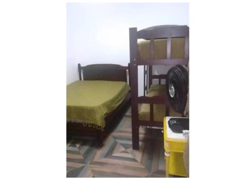 Ένα ή περισσότερα κρεβάτια σε δωμάτιο στο Casa ótima no Itaguá