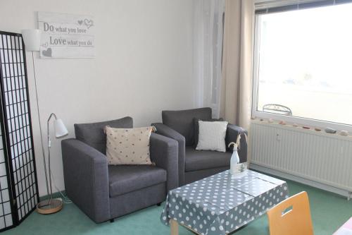 Χώρος καθιστικού στο Ferienwohnung K610 mit Meerblick