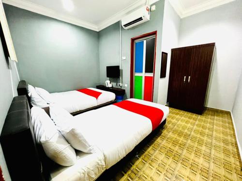 Postel nebo postele na pokoji v ubytování DAILY INN HOTEL
