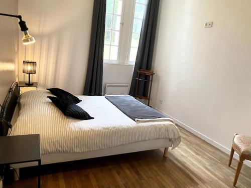 Postel nebo postele na pokoji v ubytování Le Brighton