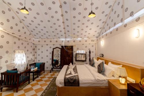 Łóżko lub łóżka w pokoju w obiekcie Golden Star Desert Camp