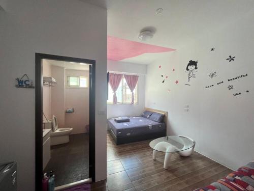 Ένα μπάνιο στο Green Island Starry Night Hostel
