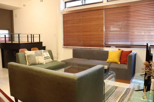 Posezení v ubytování ロハスResort宮浦