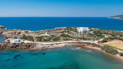an aerial view of a small island in the ocean at Martineli Residence - A Beachfront Estate in Drios