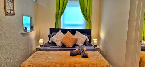 Un pat sau paturi într-o cameră la Apartment Clacton Seaside Central location