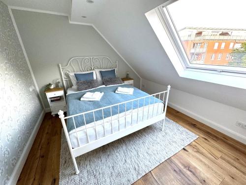 Ένα ή περισσότερα κρεβάτια σε δωμάτιο στο Customflats Erfurt - Tiefgarage - frisch renoviert