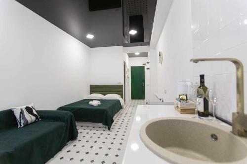 Katil atau katil-katil dalam bilik di Best apartment at the center of Kutaisi