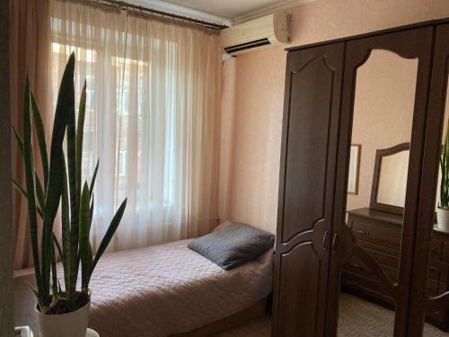 Ένα ή περισσότερα κρεβάτια σε δωμάτιο στο Apartment Artynova 29