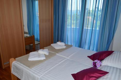 Katil atau katil-katil dalam bilik di Apartments Bošković