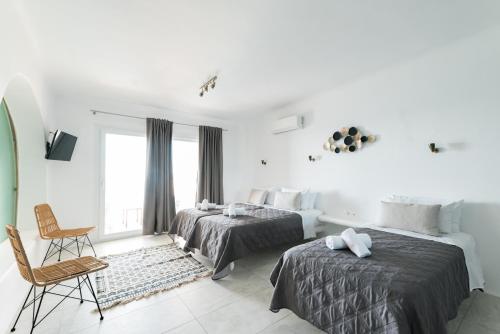 Ένα ή περισσότερα κρεβάτια σε δωμάτιο στο New Paradise Beach Resort - Adults only