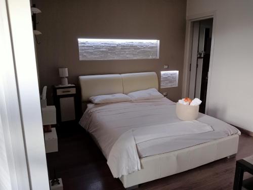 Ένα ή περισσότερα κρεβάτια σε δωμάτιο στο Casa Vacanze MURANUM - B&B