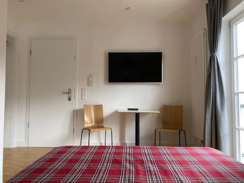 Μια τηλεόραση ή/και κέντρο ψυχαγωγίας στο Modernes Apartment in Hammersbach / Grainau