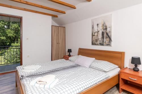 Ένα ή περισσότερα κρεβάτια σε δωμάτιο στο Villa Darija with Heated Pool