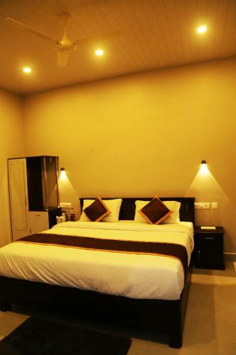 Cama o camas de una habitación en CeeCee Grand