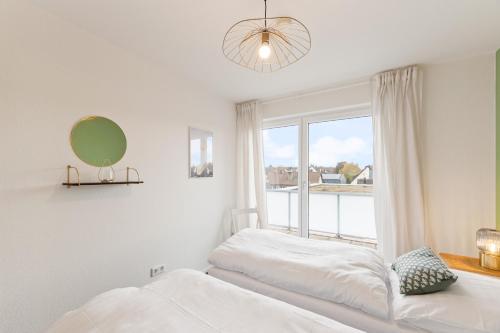 Postel nebo postele na pokoji v ubytování Design-Apartment - Küche - Dachterrasse - zentral
