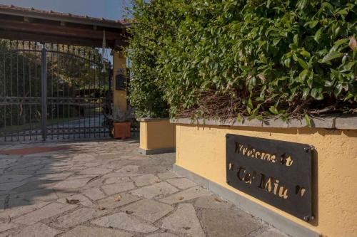 a sign that says welcome to a building at CàMia Lovely house ValDiVara 5Terre hiking in Sesta Godano
