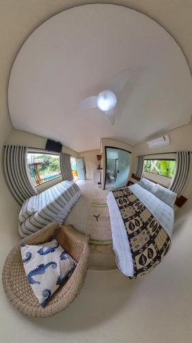 an overhead view of a bedroom with two beds at Diver Village Ilhabela in Ilhabela