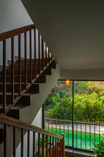 Zahrada ubytování Locomo Boutique, Morjim - Cozy tropical stay, near beach