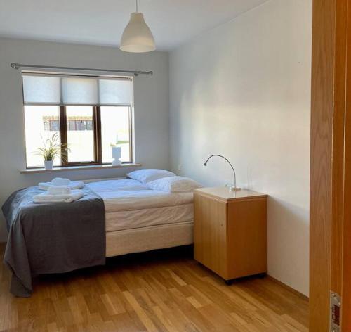 Postel nebo postele na pokoji v ubytování KEF Spacious & comfi appartment