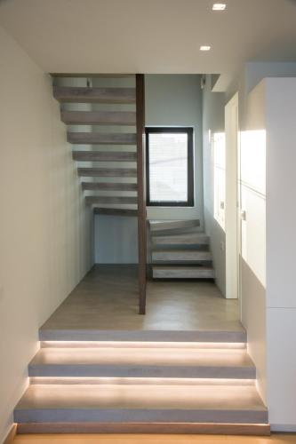 a staircase in a house with a window at GM exclusive Luxury Suites & SPA in Sitia