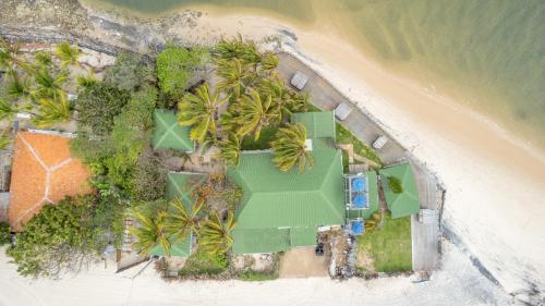 an aerial view of a resort on a beach at Santa Maria Atins in Atins