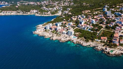 an aerial view of an island in the water at APARTMANI LUX SEA in Utjeha
