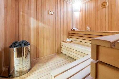 a sauna with a trash can in the middle at Jazz Hotel in Tbilisi City