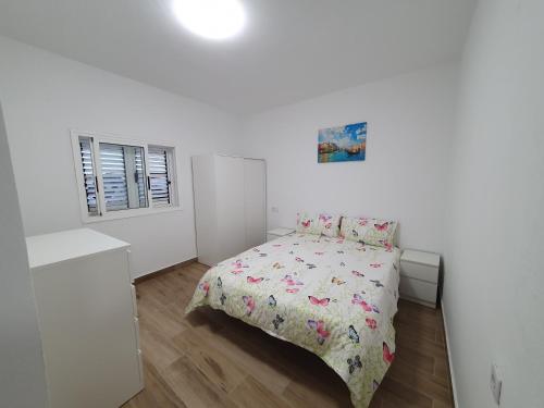 Ένα ή περισσότερα κρεβάτια σε δωμάτιο στο Casita isabelita