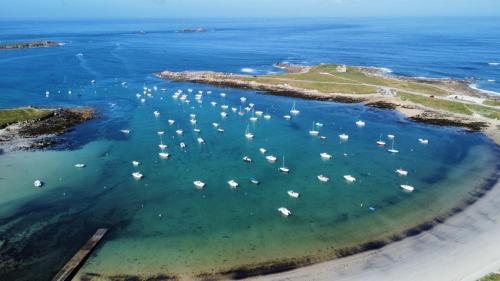 an aerial view of a harbor with boats in the water at Villa Vue Mer in Lanildut