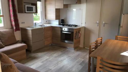 Photo de la galerie de l'établissement MOBIL HOME CLIMATISE 2 CHAMBRES CLIMATISE CAMPING 4 ETOILES LE LAC DES REVES, à Lattes