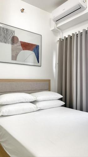 Postel nebo postele na pokoji v ubytování L. Casa • Tagaytay Staycation
