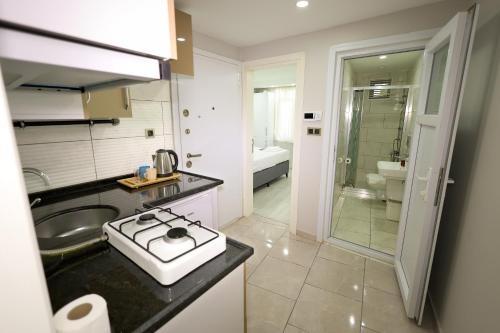 Kuchyň nebo kuchyňský kout v ubytování JOE BLACK APART