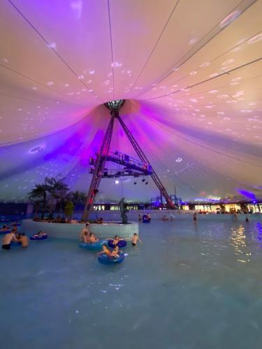 a group of people in the water at a water park at Bešeňová Apartmán Relax in Bešeňová
