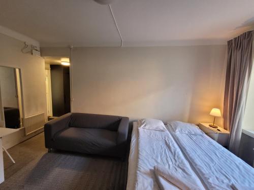 Postel nebo postele na pokoji v ubytování Home Inn PIP22