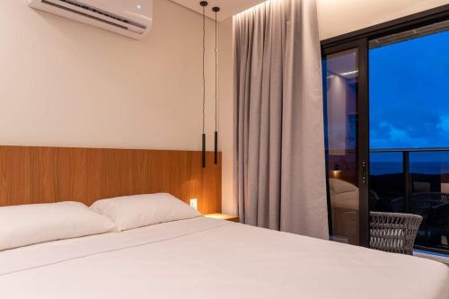 Postel nebo postele na pokoji v ubytování Salinas Premium Resort A&D