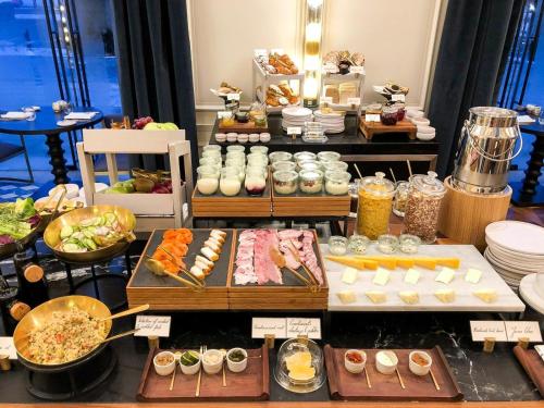 a buffet of food on display in a restaurant at New Gudauri Atrium Apartment 202 in Gudauri