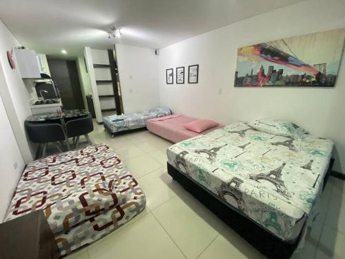 Postel nebo postele na pokoji v ubytování Disfruta hermoso apartaestudio