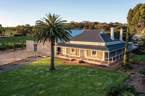 an aerial view of a house with a palm tree at The Residence at Schubert Estate in Nuriootpa