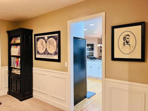 a room with a door leading to a kitchen at Sopra Bella- 4 bedroom home in Corvallis