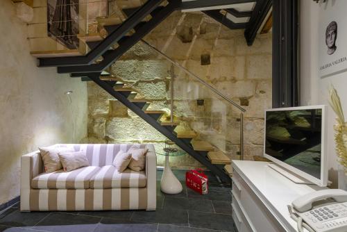 Una televisión o centro de entretenimiento en Villa Valeria