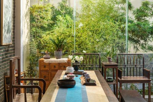 Jardin de l'établissement Guilin HeShe Lakeside Resort-Free pick up train station stay two nights