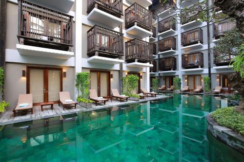 Πισίνα στο ή κοντά στο THE 1O1 Bali Oasis Sanur