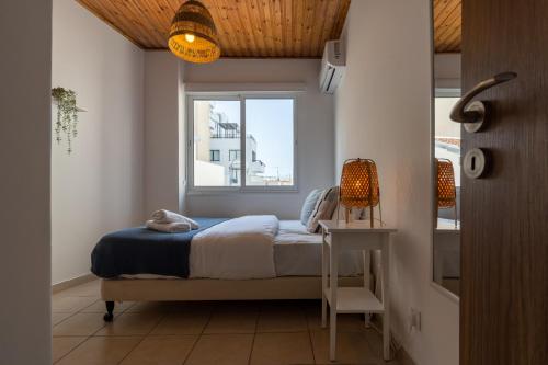 Postel nebo postele na pokoji v ubytování Laurel 2-Bedroom Apartment in Larnaca