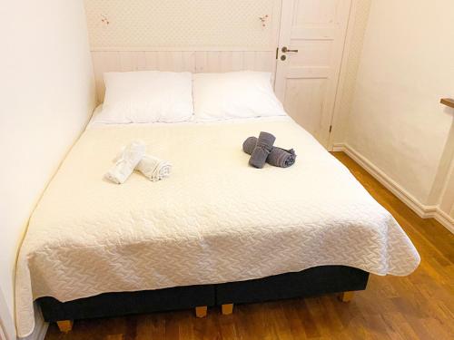 Postel nebo postele na pokoji v ubytování Central Serenity Suite