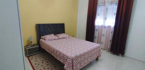 Postel nebo postele na pokoji v ubytování villa mimosa avec parking intérieur