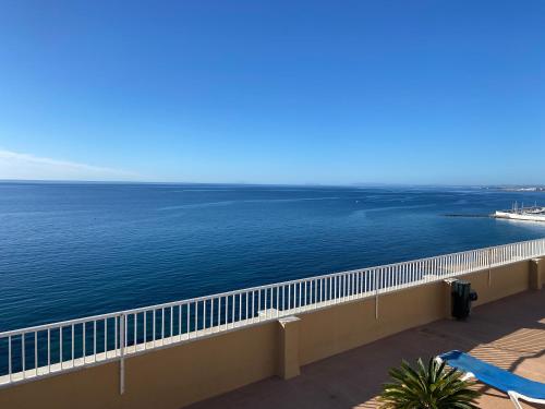 a view of the ocean from a balcony at Marbella Beach Front Edificio Mayoral Centro Ciudad y Primera Línea Playa Muy Amplio y Espacioso in Marbella