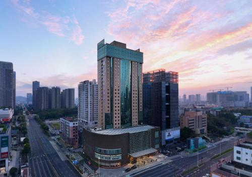 a view of a city with tall buildings at Wan Yue Grand Skylight Hotel in Bao'an